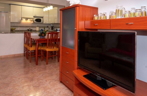 Malgrat de Mar Apartment | Cosy apartment for 4 people with WIFI, pool, A/C, TV and balcony