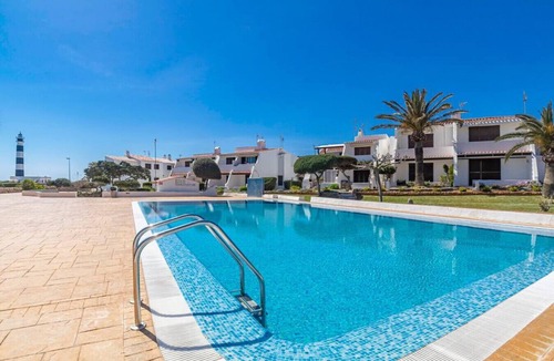 Cap d'Artrutx Condo | Cozy 2 bedroom flat with swimming pool and wifi