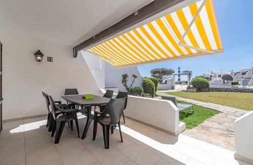 Cap d'Artrutx Condo | Cozy 2 bedroom flat with swimming pool and wifi