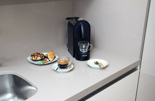 Torremolinos Apartment | DELUXE APARTMENT- BEACHFRONT, SWIMMING POOL, A/A, FREE WIFI AND PARKING