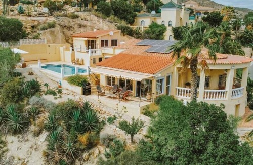 Coveta Fuma Ski Chalet | Elegant cliffside villa in Coveta Fuma with spectacular sea view