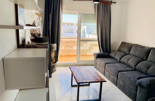 Retamar Apartment | Encantador ático con chimenea y piscina en Almería