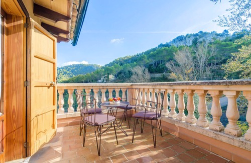 Lluc House | ES VINT I NOU - Beautiful house with great terrace amidst the mountains.