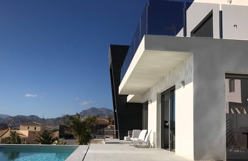 Llano de los Pastores Villa | Fantastic new modern villa with infinity pool, wifi, air conditioning