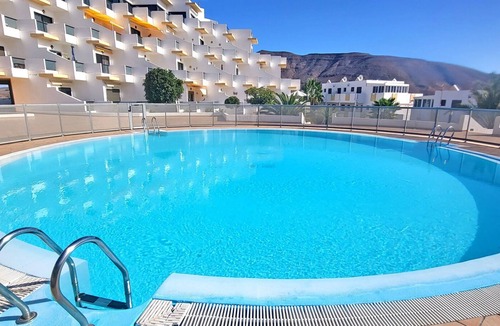 Giniginamar Apartment | Ferienwohnung Aurora in Giniginamar, Meerblick, Gemeinschaftspool