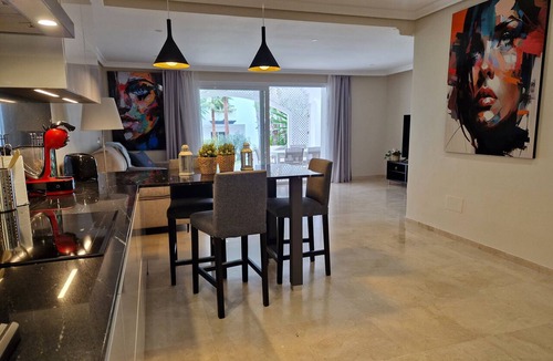 New Golden Mile Apartment | First Line ground floor App. with garden, 6 people, directly at sea and pool.