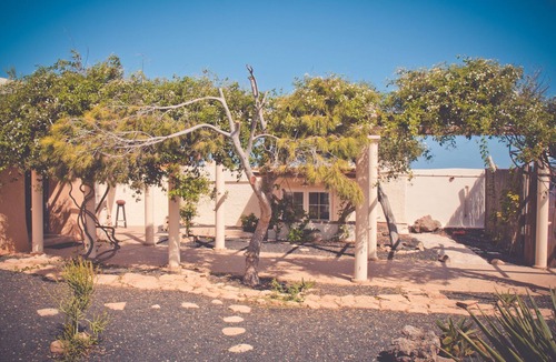 La Pared House | Garden apartment - Tierra - Surf & Yoga Villa