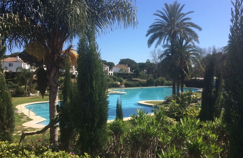 El Paraiso Apartment | Garden Apt Benamara - modern 1 bed apt with garden, huge pool, family area, wifi