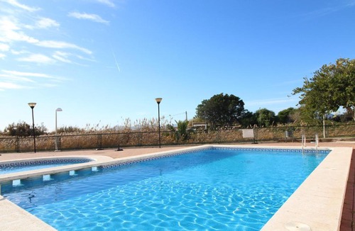 Playa de Almarda Apartment | Global Vacacional, Apartamento en Marjal de Corinto con Piscina