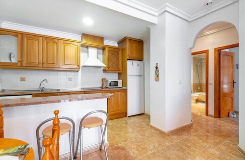 Orihuela Costa Apartment | Holiday Apartment "En El Cabo Roig" with Shared Pool, Private Balcony & Wi-Fi