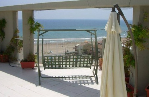 Puig Apartment | Holiday Apartment 'Moderno Atico Dúplex' near the Sea with Shared Pool, Terrace & Wi-Fi