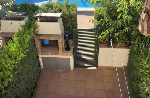 L'Escala House | Holiday Home 'Casa Mas Estel' with Mountain View, Wi-Fi and Air Conditioning