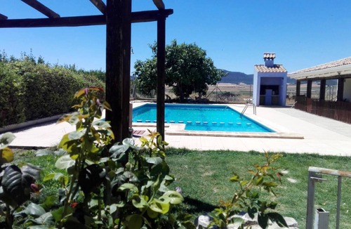 Caravaca de la Cruz House | Homerez - House for 8 ppl. with shared pool, jacuzzi and terrace at Noguericas