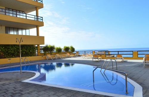 San Miguel de Abona Apartment | IMMENSE PRIVATE TERRACE WITH DIRECT SEA VIEW AND AIR CONDITIONED SWIMMING POOLS, WiFi