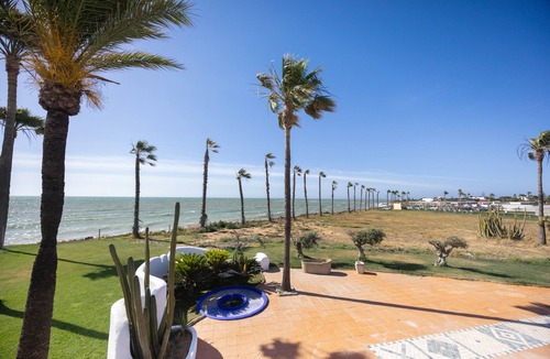 Chipiona Apartment | Isla Verde 8: Garden Room in a Relaxing Cadiz Villa