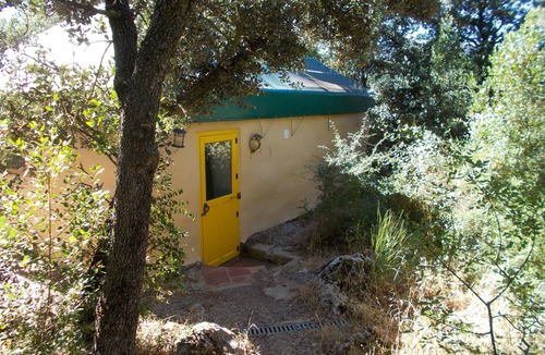Zafarraya House | La Carpa.Bigtop in a woodland setting