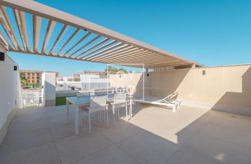 San Pedro del Pinatar Apartment | La Llana penthouse oasis with rooftop kitchen and pool - by OYOOSTAYS