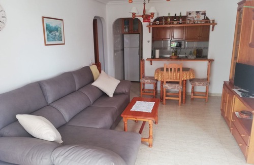 Vera Beach Apartment | Living room with balcony and sea view, waterfront and south-facing