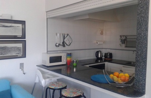 El Medano Apartment | Lovely 2 bedroom apartment, terrace, sea view & wifi, 1 minute walk to the beach