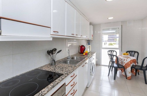 Sant Antoni de Calonge Apartment | Lovely apartment for 6 people with WIFI, pool, TV and terrace