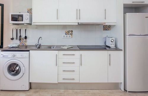Binisafua Apartment | Lovely Vacation Apartment "Binisafua Playa - Apartamento 23" Near the Beach with Shared Outdoor Pool, A/C, Wi-Fi, Terrace & Garden; Parking Available