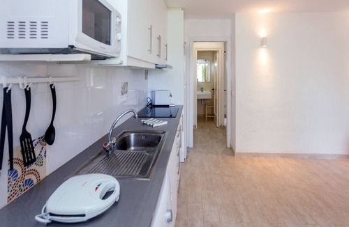 Binisafua Apartment | Lovely Vacation Apartment "Binisafua Playa - Apartamento 23" Near the Beach with Shared Outdoor Pool, A/C, Wi-Fi, Terrace & Garden; Parking Available