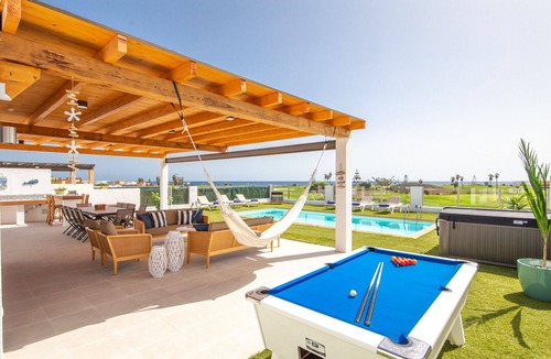 Costa de Antigua Villa | Luxury Family Villa, Jacuzzi, Oceanfront, Heated Pool, Playground, A/C