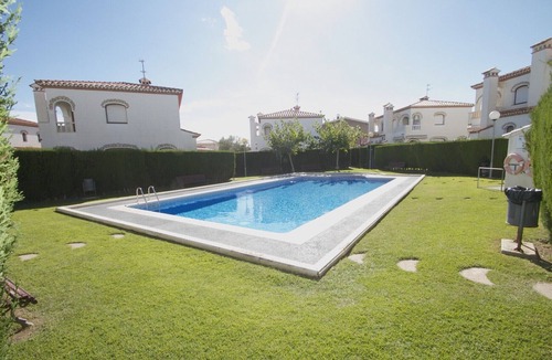 Miami Platja Ski Chalet | MASIA1 adosado con jardín privado y piscina comun
