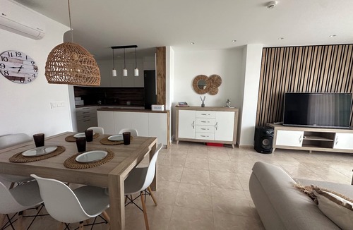 Pueblo Latino Condo | Mil Palmeras penthouse vacation rental
