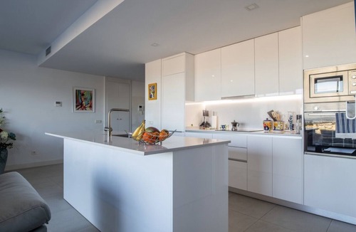 Estepona Condo | Modern 3 bedroom penthouse with mountain and sea views.