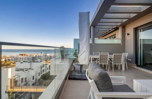 Estepona Condo | Modern 3 bedroom penthouse with mountain and sea views.