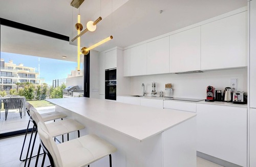 Fuengirola Apartment | Modern El Higueron West Apt with Private Garden & BBQ
