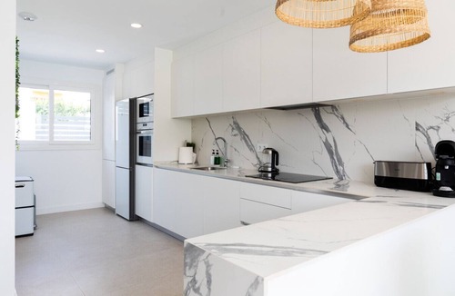 Carihuela House | Modern Two-Floor Townhouse Next to the Beach