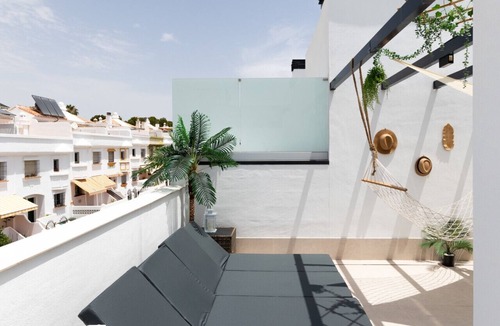 Carihuela House | Modern Two-Floor Townhouse Next to the Beach