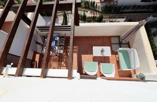 Mar de Pulpi Apartment | Nuestra Casa apartamento con terraza azotea y piscina compartida