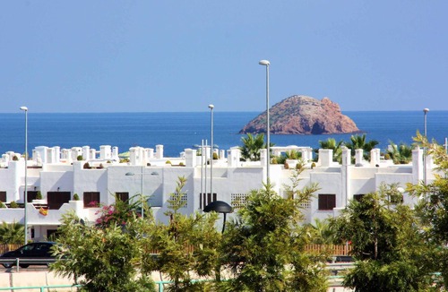 Mar de Pulpi Apartment | Palmera, apartment with balcony, roof terrace and communal pool