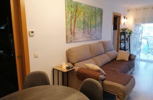 Calella Apartment | Playa, terraza, aire acondicionado, parking