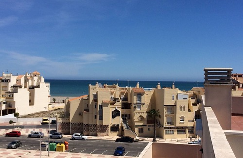 Roquetas de Mar Apartment | Quiet sunny apartment, 3 min walk to beach, communal pools, terrace, WIFI A/C TV