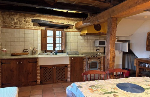 Sedano House | Renovated house with 2 bedrooms, 1 bathroom and living-dining room in stone and wood is very cozy.