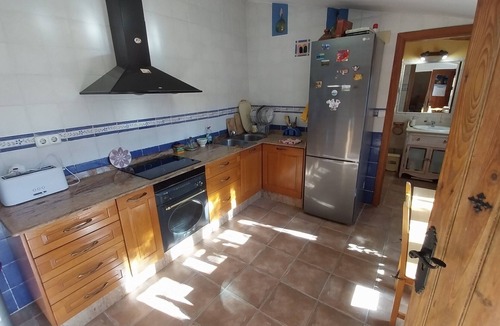 La Nora House | Room with pool and patio in a shared house