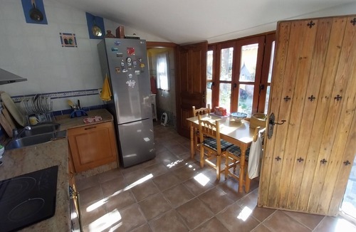 La Nora House | Room with pool and patio in a shared house