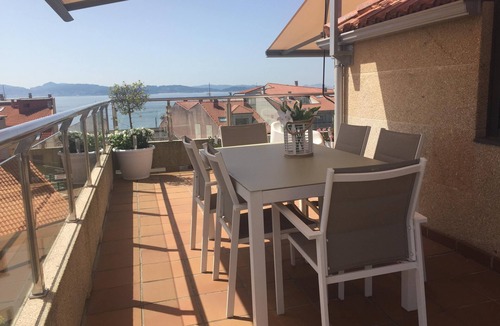 Sanxenxo Apartment | Spectacular penthouse with terrace and views of the Port(Wifi and Garage)