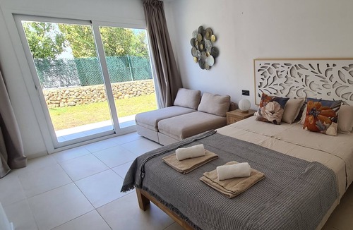 Sant Jaume Mediterrani House | Stunning modern villa with stunning Son Bou beach views, heated pool