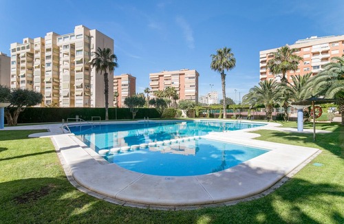 Playa de San Juan Apartment | 'Urbanización Bulevar Playa' Apartment with Shared Pool, Wi-Fi, and Air Conditioning