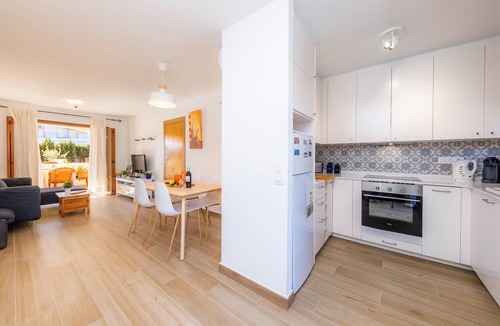 Cala Agulla House | Vacation Home "Can Nogueras" with Wi-Fi, Balcony, Terrace, Shared Pool and Garden