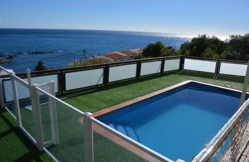 Llanca Villa | Villa con aire acondicionado, piscina climatizada y vistas al mar