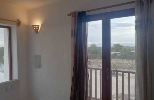 Es Pujols Villa | Villa "Els Castells" with Shared Pool & Wi-Fi