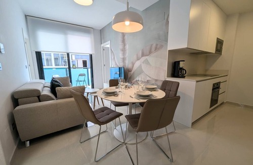 Torrevieja Apartment | Villa 'R-60-A Maestro' with Shared Pool, Wi-Fi and Air Conditioning