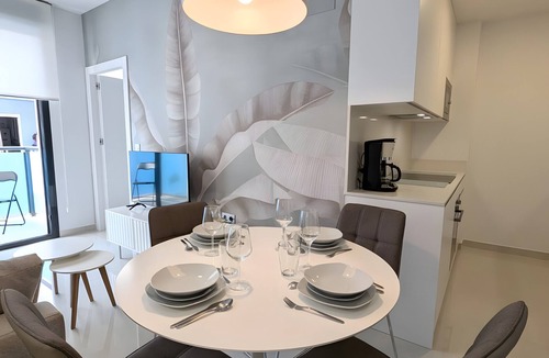 Torrevieja Apartment | Villa 'R-60-A Maestro' with Shared Pool, Wi-Fi and Air Conditioning