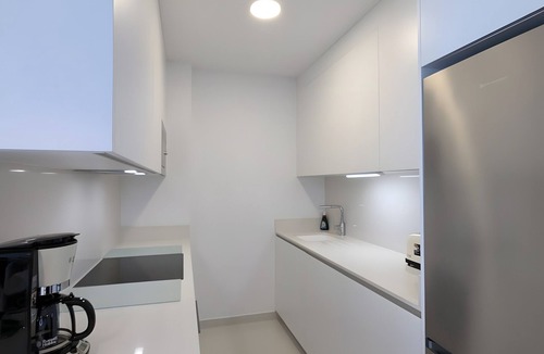 Torrevieja Apartment | Villa 'R-60-A Maestro' with Shared Pool, Wi-Fi and Air Conditioning